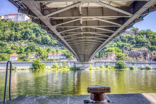 View Underneath A Road Bridge Across A River