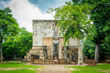 Ancient Buddhas statue Old temple at Sukhothai Historical Park in Thailand.