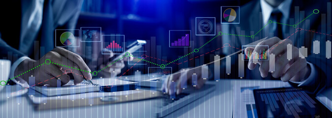 Businessman hands working on network and digital finance marketing chart with future technology innovation and digital transformation concept.
