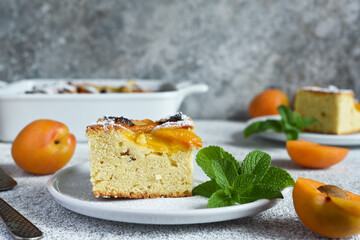 Wall Mural - cake with apricots. Homemade pie with peaches and apricots on the kitchen table.