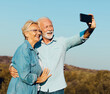© Lumos sp - woman man outdoor senior couple happy lifestyle retirement together smiling love selfie camera mature