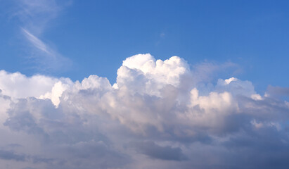 Evening blue sky. Big white clouds