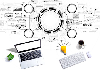 Wall Mural - Tech circle with computers with a light bulb