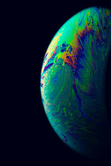 Wall Mural - Globe light. Abstract galaxy background with planet earth in universe space with sunlight on dark background. Fantastic structure of colorful bubbles.