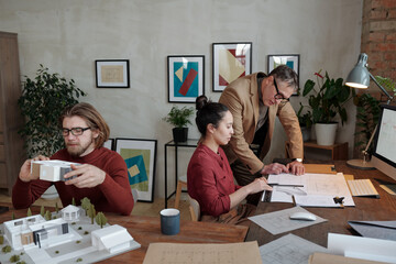 Wall Mural - Architects working in office