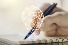 Creative Idea Concept With Light Bulb Illustration And Hand Writing In Notebook On Background. Multiexposure