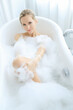 © racool_studio - Woman in a bathtub