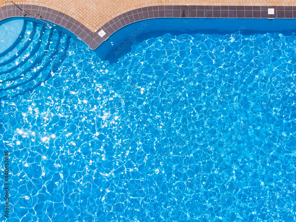 Pool Form Above pool from above view. blue water surface in the swimming pool, water in ...