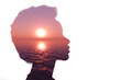 © primipil - Multiple exposure image with sunrise and sea inside african american woman silhouette. Psychology concept.