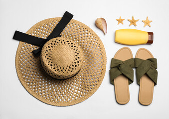 Flat lay composition with beach objects on white background