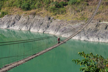 Landscape View Of Spectacular Bamboo Hanging Bridge Across The Turquoise Green River Siang Or Siyom, Arunachal Pradesh, India