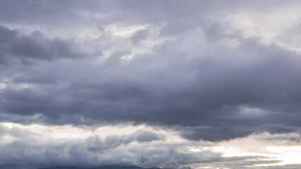 Wall Mural - waves of dramatic cloudscape in rainy summer season. timelapse hurricane weather forecast. darkness 