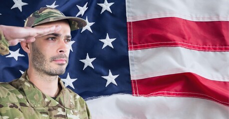 Poster - Composition of male soldier saluting over american flag