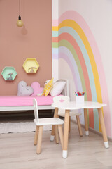 Sticker - Cute child's room interior with beautiful rainbow painted on wall