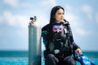 asian woman in scuba diving gear.