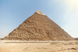 Pyramid of Chephren on a blue sky background. Great Pyramids of Giza in the desert. second pyramid