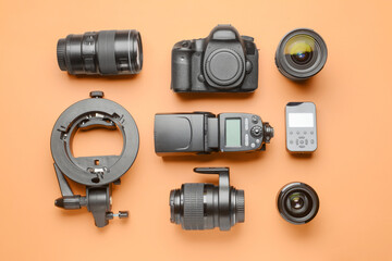 Wall Mural - Modern photographer's equipment on color background