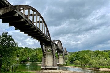 Rainbow bridge over the famous White River in Cotter, Arkansas, Trout Capital of the World - Historic Ruthven Rainbow Arch Bridge