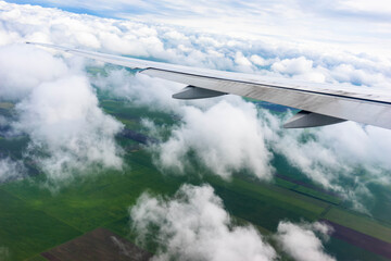 Wing of an airplane in the sky.