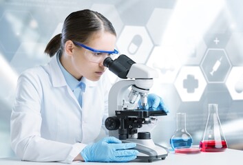 Wall Mural - science technology concept. scientific examination. a scientist with a microscope