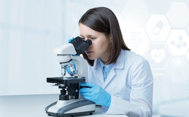 Wall Mural - science technology concept. scientific examination. a scientist with a microscope