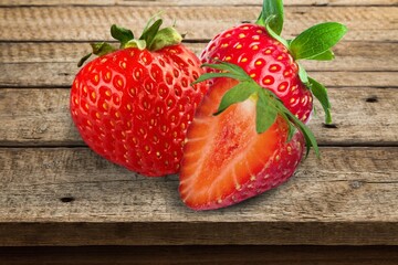 Fresh tasty red ripe natural strawberry on a desk.