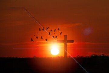 Wall Mural - Christian wooden cross on hill outdoors at sunset. Crucifixion Of Jesus