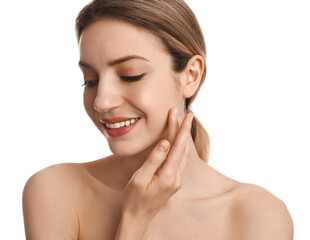 Wall Mural - Young woman applying facial cream on white background