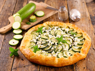 Sticker - zucchini tart with feta cheese and mint leaf