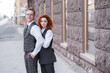 © Павел Костенко - Redhead husband and wife. Portrait of a couple on the street