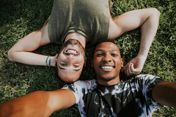 Sticker - Gay couple relaxing in the grass