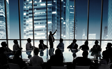 Wall Mural - Business people in a board room meeting
