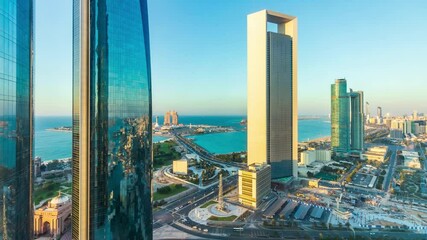 Wall Mural - ABU DHABI, UNITED ARAB EMIRATES - Dec 16, 2018: This is a timelapse video of the Abu Dhabi skyline showing ADNOC's building and the iconic Etihad Towers in Downtown Abu Dhabi.