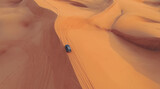 Fototapeta  - AERIAL. Hight flight above car. Desert safari car sand dunning in the Dubai desert during sunset