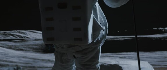 Wall Mural - portrait of asian lunar astronaut placing a flag pole on the moon surface. easy to track and add you