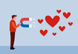 © Orapun - Man attracting the red heart in flat design. Magnetic love.