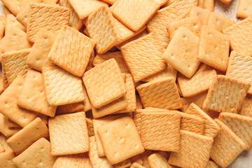 Tasty crackers as background, closeup