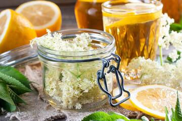 Elderberry flowers and lemon drink. Healing tincture is a medicine made from elderberry flowers.