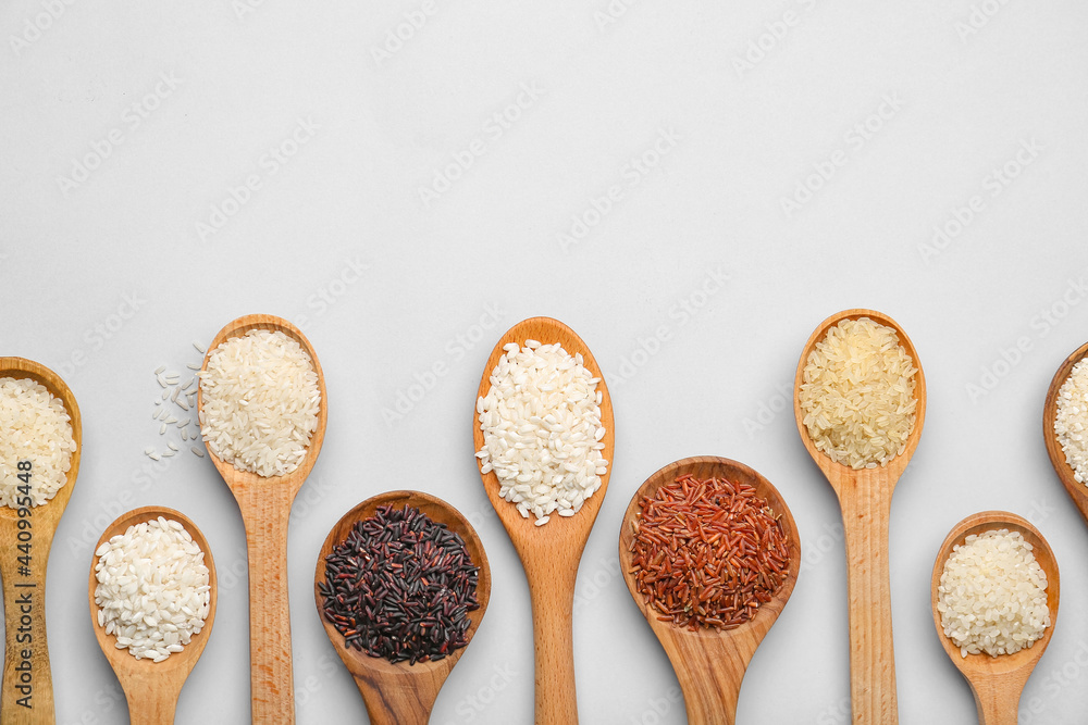 Texture Rice Spoon Spoons with different types of raw rice on light background Stock Photo ...
