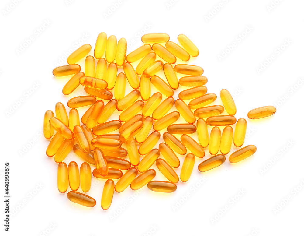 Fish oil capsules on white background