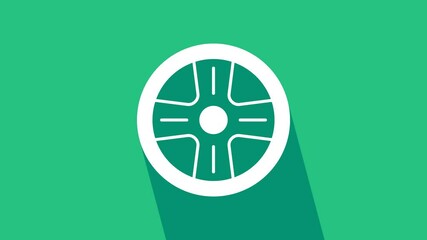 Canvas Print - White Alloy wheel for a car icon isolated on green background. 4K Video motion graphic animation