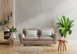 Brown sofa and a wooden table in living room interior with plant,concrete wall.