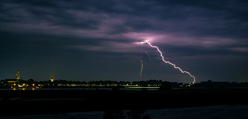 Sticker - Lightning bolt strikes from the base of a high based storm