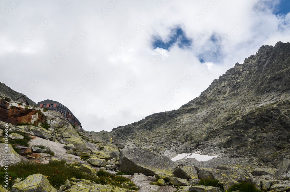 Mount Rysy Beautiful mountain landscape with Chata pod Rysmi a hut of the foot of ...