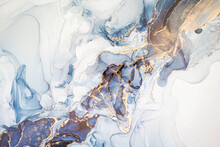 High Resolution. Luxury Abstract Fluid Art Painting In Alcohol Ink Technique, Mixture Of Dark Blue, Gray And Gold Paints. Imitation Of Marble Stone Cut, Glowing Golden Veins. Tender And Dreamy Design.