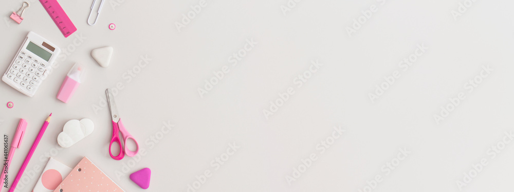 Pink school stationery on a grey background. Top view. Flat lay. Back ...