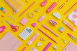 Pattern composition of school stationery on a yellow background. Back to school concept.