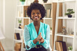 © Studio Romantic - Beautiful proud woman clapping hands. One black lady applauding congratulating on success or showing gratitude for videoconference workshop she enjoyed. Videocall screen, web cam view female head shot