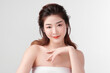 © kitthanes  - Beautiful young asian woman with clean fresh skin on white background, Face care, Facial treatment, Cosmetology, beauty and spa, Asian women portrait.