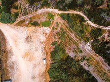 Aerial View Of A Small Motorhome Parked In The Bush In Odeceixe, Faro, Portugal.